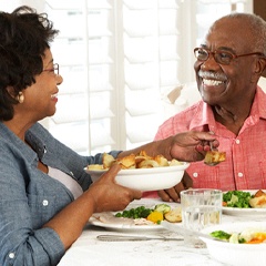 Older couple enjoying a meal together