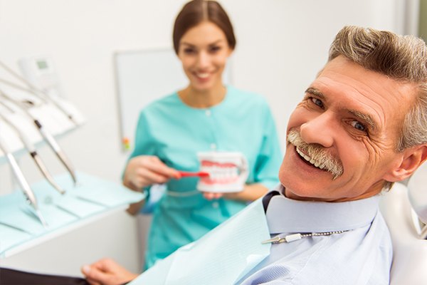 Patient smiling in dental chair