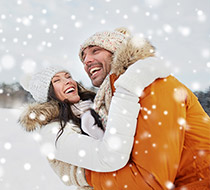 Couple Smiling in the snow