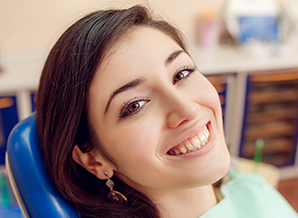 Smiling woman in dental chair