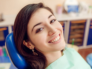 Smiling woman in dental chair