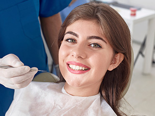 Woman smiling in dental chair