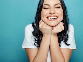 woman showing off her beautiful smile