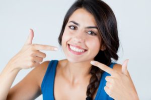 woman pointing smile