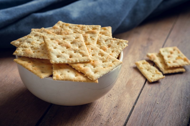 A bowl of saltine crackers ready to disrupt your dental health