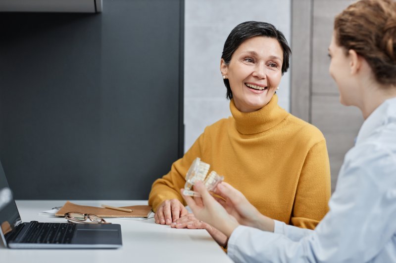 An older woman at the dentist for better oral health