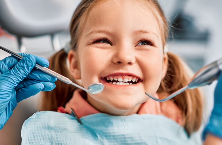 Little girl in dental chair